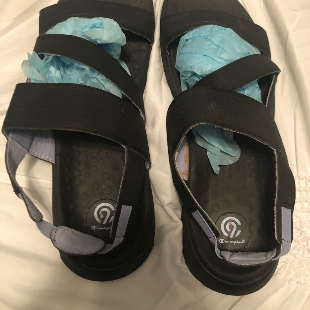 Champion active sandals.Never worn just tried on fits a narrow foot.